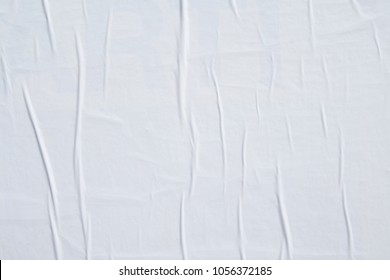 a white empty weathered wrinkled urban billboard paper poster texture  - Shutterstock ID 1056372185