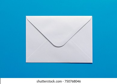 White Envelope On Blue Background