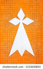 White Ermine On An Orange Tile Wall Of A Butcher Shop In Brittany.