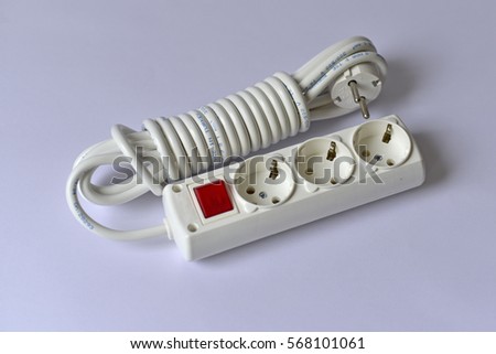 White extension cable with three plug socket and red switch