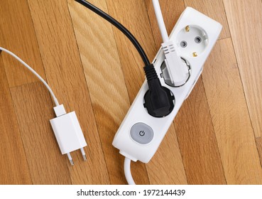 White Extension Cord With Three Outlets. Power Strip With Switch For Home Or Office.