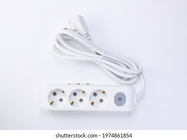 White Extension Cord With Three Outlets. Power Strip With Switch For Home Or Office.