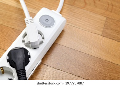 White Extension Cord With Three Outlets. Power Strip With Switch For Home Or Office.