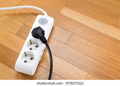 White Extension Cord With Three Outlets. Power Strip With Switch For Home Or Office.