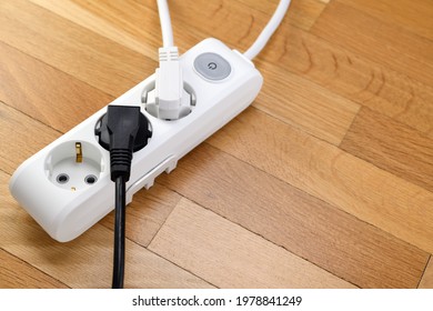 White Extension Cord With Three Outlets. Power Strip With Switch For Home Or Office.