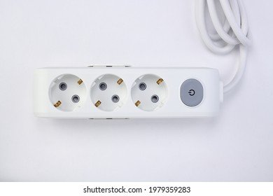 White Extension Cord With Three Outlets. Power Strip With Switch For Home Or Office.