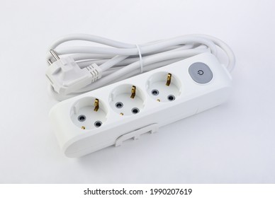 White Extension Cord With Three Outlets. Power Strip With Switch For Home Or Office.