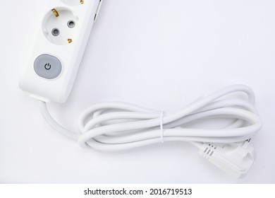 White Extension Cord With Three Outlets. Power Strip With Switch For Home Or Office.