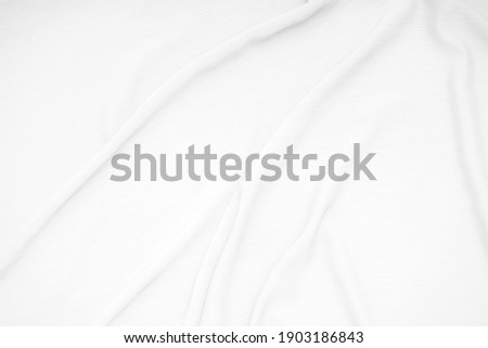 White fabric texture waves background.