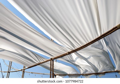 White White Fabric Texture Wind Blowing Background, Texture Of Flying Fabric.