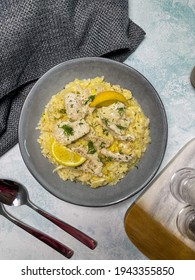 White Fish Risotto With Lemon And Dill Overhead Photo With Cutlery