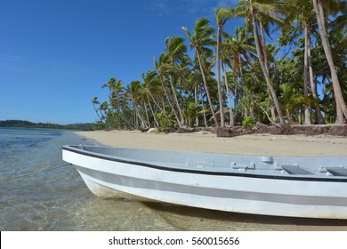 White Fishing Boat On A Tropical Island In The Yasawa Islands Group, Fiji