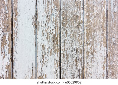 White Flaky Paint On A Old Weathered Wooden Fence. Vintage Wood Background. 