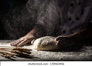 White flour flying into air as pastry chef in white suit slams ball dough on white powder covered table. concept of nature, Italy, food, diet and bio. - Powered by Shutterstock