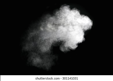 white flour smoke on black background
