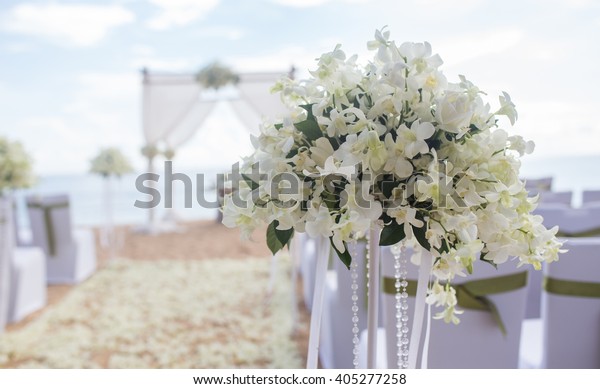 White Flowers Decorations During Outdoor Wedding Stock Photo