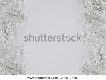 White flowers with white space for text background.