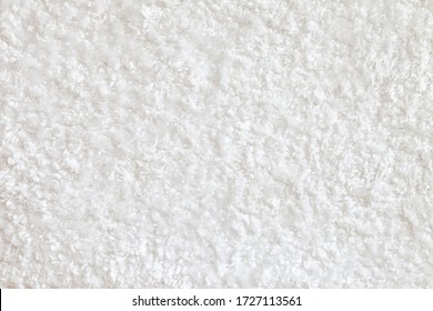 White Fluffy Carpet Texture. Soft Luxury Shag Rug. Short Shag Carpet Surface. Domextic High-density White Rug.