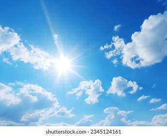 White Fluffy Clouds in The Blue Sky on A Sunny Day