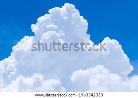 White fluffy clouds on blue sky. Soft touch feeling like cotton. White puffy cloudscape. Beauty in nature. Close-up white cumulus clouds texture background. Sky on sunny day. Pure white clouds.