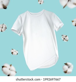 White flying cotton T-shirt isolated on turquoise background.Clean white t-shirt for women or men.   - Shutterstock ID 1992697667