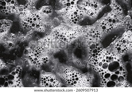 White foam bubbles texture. Soap water background. Clean foam abstract. Fresh soapy surface. Washing bubble layer. Cleaning bubbles closeup. Shiny wet foam surface. Hygiene cleaning pattern.