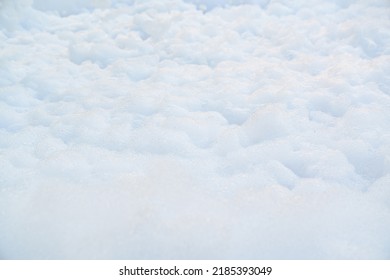 White Foam For Foam Party. Dancing To Music On A Dance Floor Covered With A Few Feet Of Foam Or Bubbles Emitted From The Foaming Agent. Background And Texture.