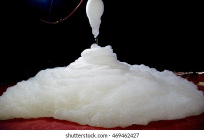 White Foam Spreads Out On The Red Floor. Foam Party