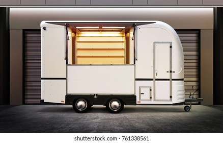 White Food Truck On Street Of City At Night