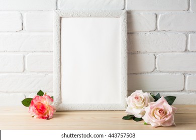 White Frame Mockup With Roses. Empty White Frame Mockup For Design Presentation. Portrait Or Poster White Frame Romantic Style Mockup