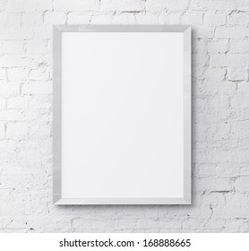 White Frame On Brick Wall