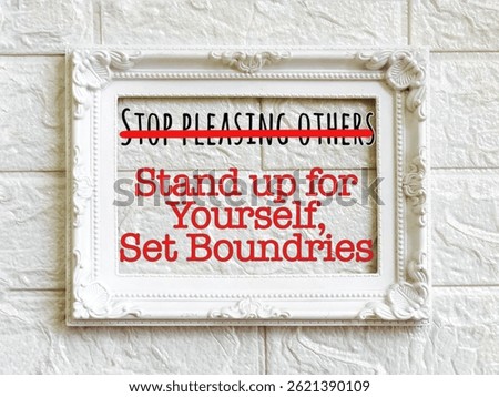 White frame with the words STOP PLEASING OTHERS, STAND UP FOR YOURSELF START SETTING BOUNDARIES on bricks background