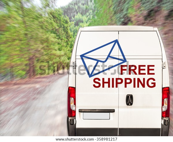White free\
shipping Van driving fast on forest\
road