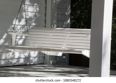 White Front Porch Swing At A House