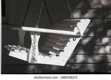 White Front Porch Swing At A House