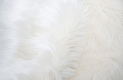 White Fur Texture. Long Pile Faux Fur Background