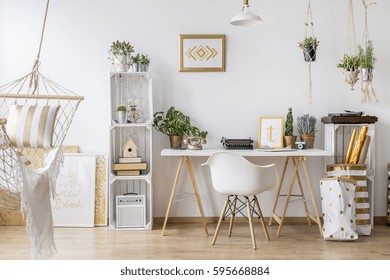 White Furniture And Wooden Floor In Stylish Study Room