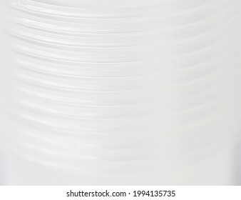 White Fuzzy Background With Blurry Image Of Corrugated Tube. High Quality Photo