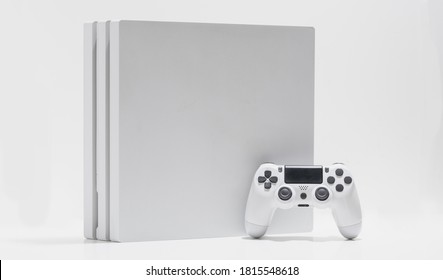 White Game Console And Controller On With Background