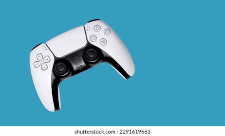 White gamepad on a blue background. Game controller for video games