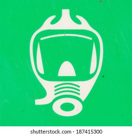 White Gas Mask Sign On A Green Background