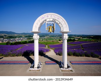 white gate and lavende flwoer