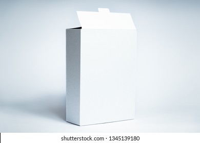 White generic box, studio shot. Blank carton food package, front view on white background