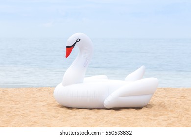 White Giant Swan Pool Inflatable On The Beach