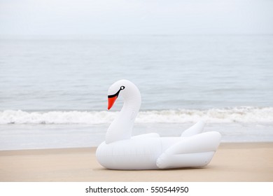 White Giant Swan Pool Inflatable On The Beach