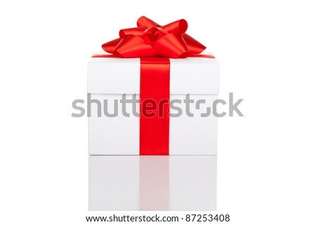 white gift box with red ribbon isolated on white