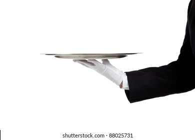 A white gloved hand holding a silver tray