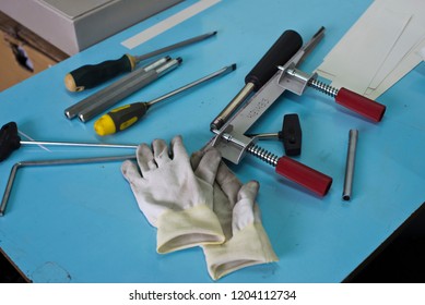 white gloves and tools
