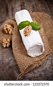 White Goat Cheese With Noble Rot On Wooden Table