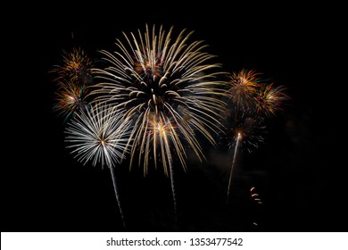 White And Gold Firework In Dark Sky